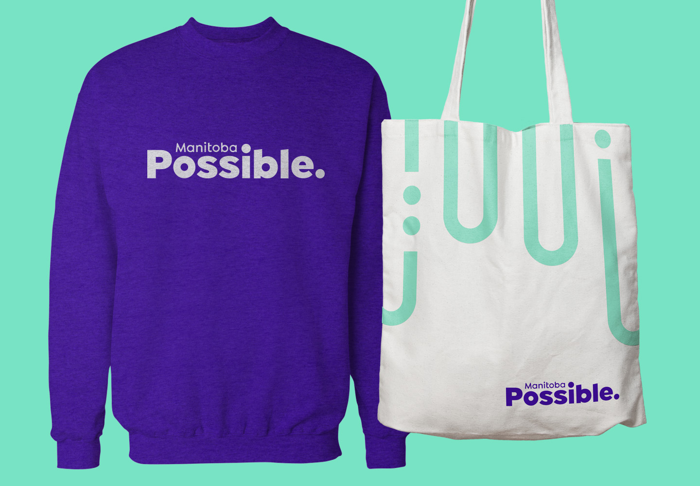 Manitoba Possible purple sweatshirt example and tote bag with the Manitoba Possible motif.