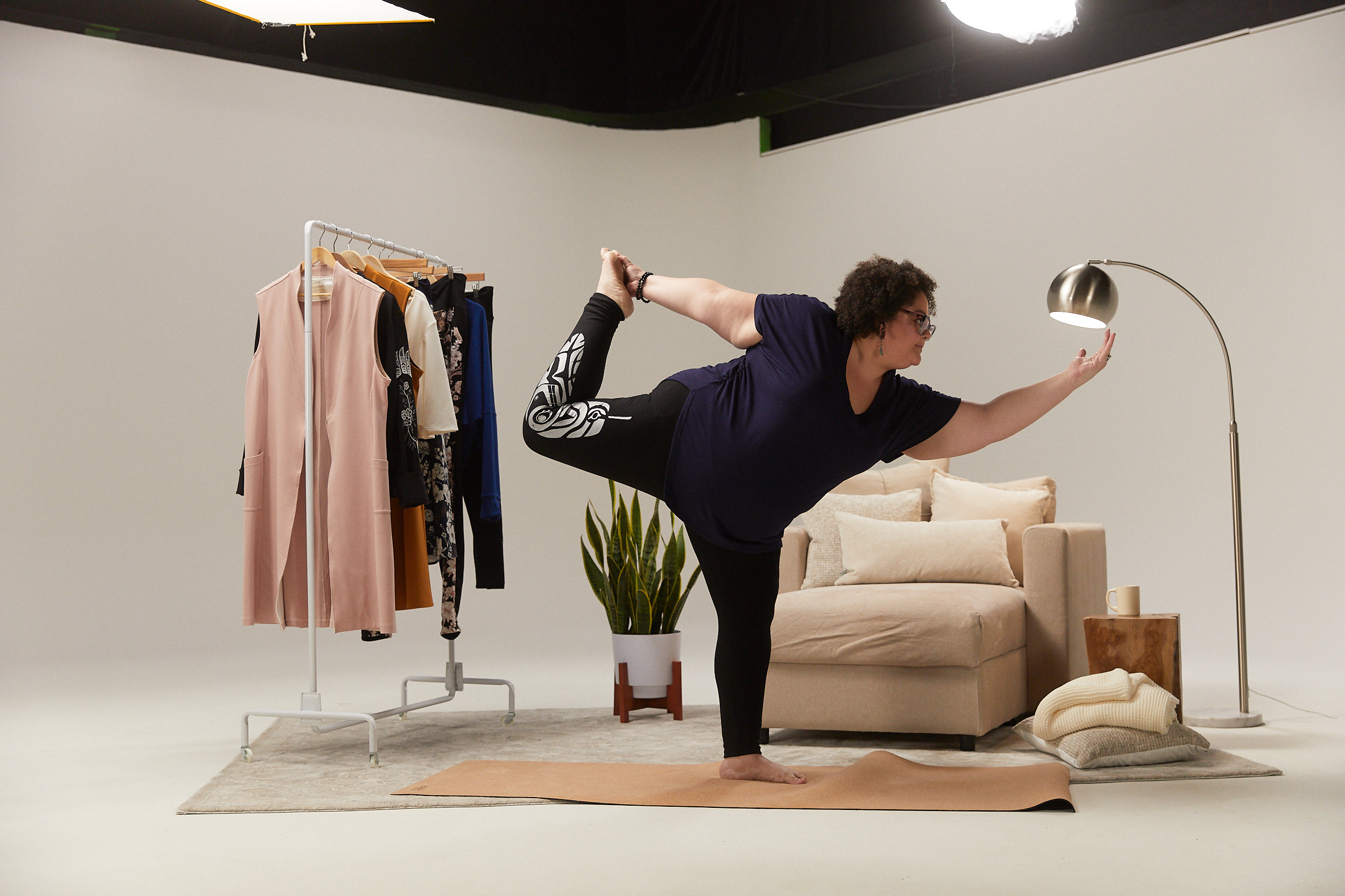 A photo of a person doing yoga for the Anne Mulaire inclusive sizing announcement.