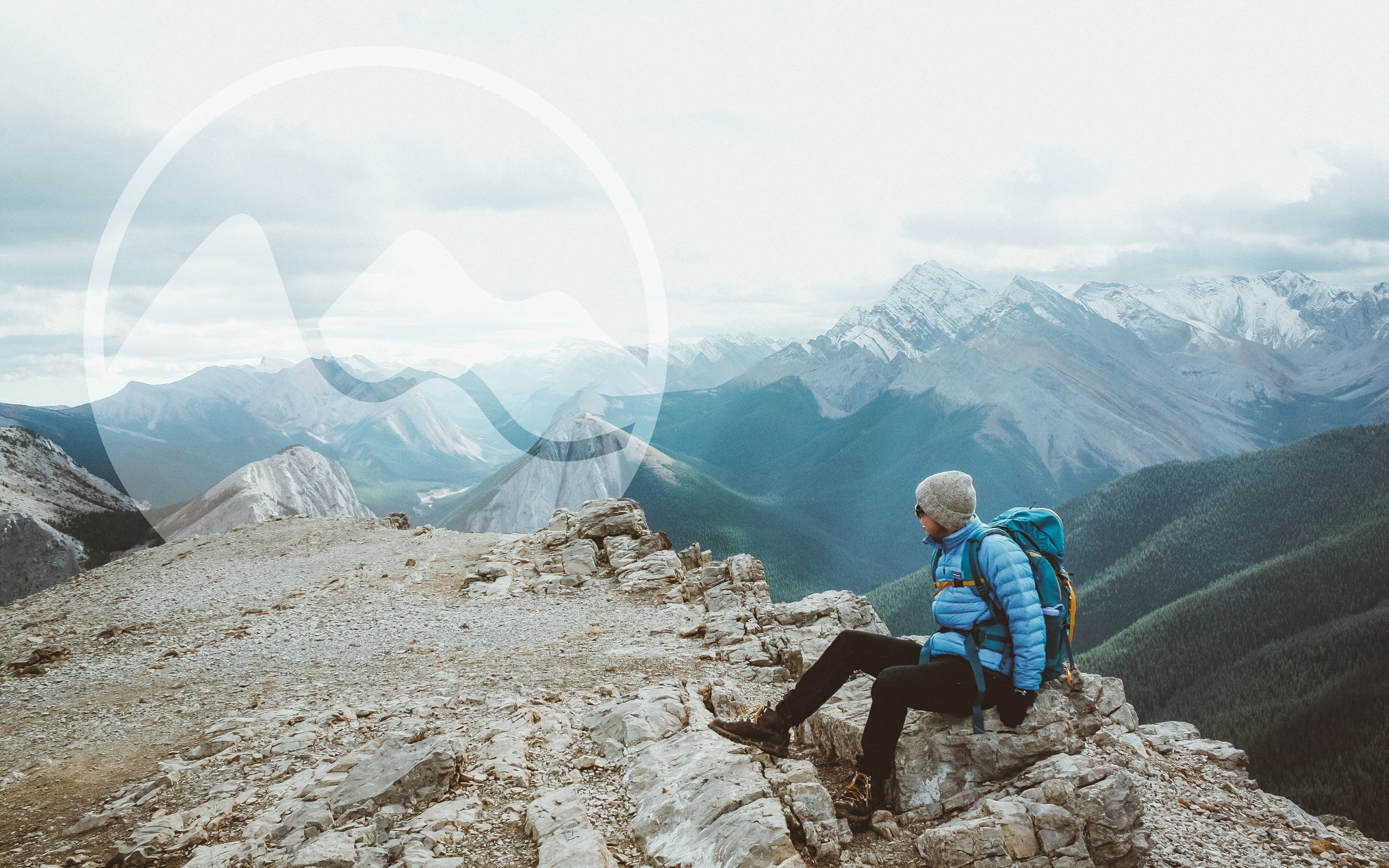Hitchweb logo as a watermark on a photo of a hiker on a mountain.