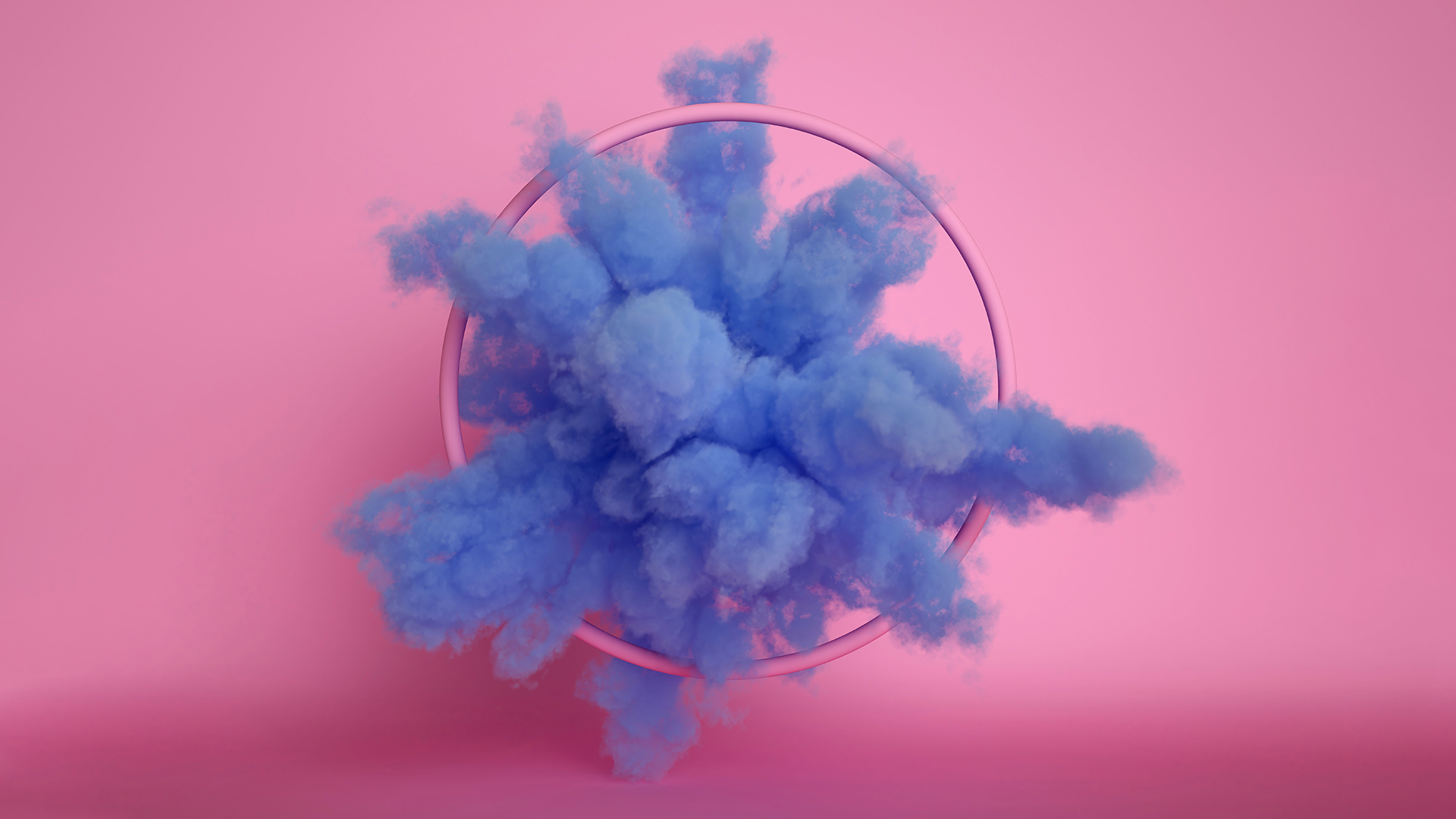 Blue cloud breaking through a pink hula hoop on a pink background