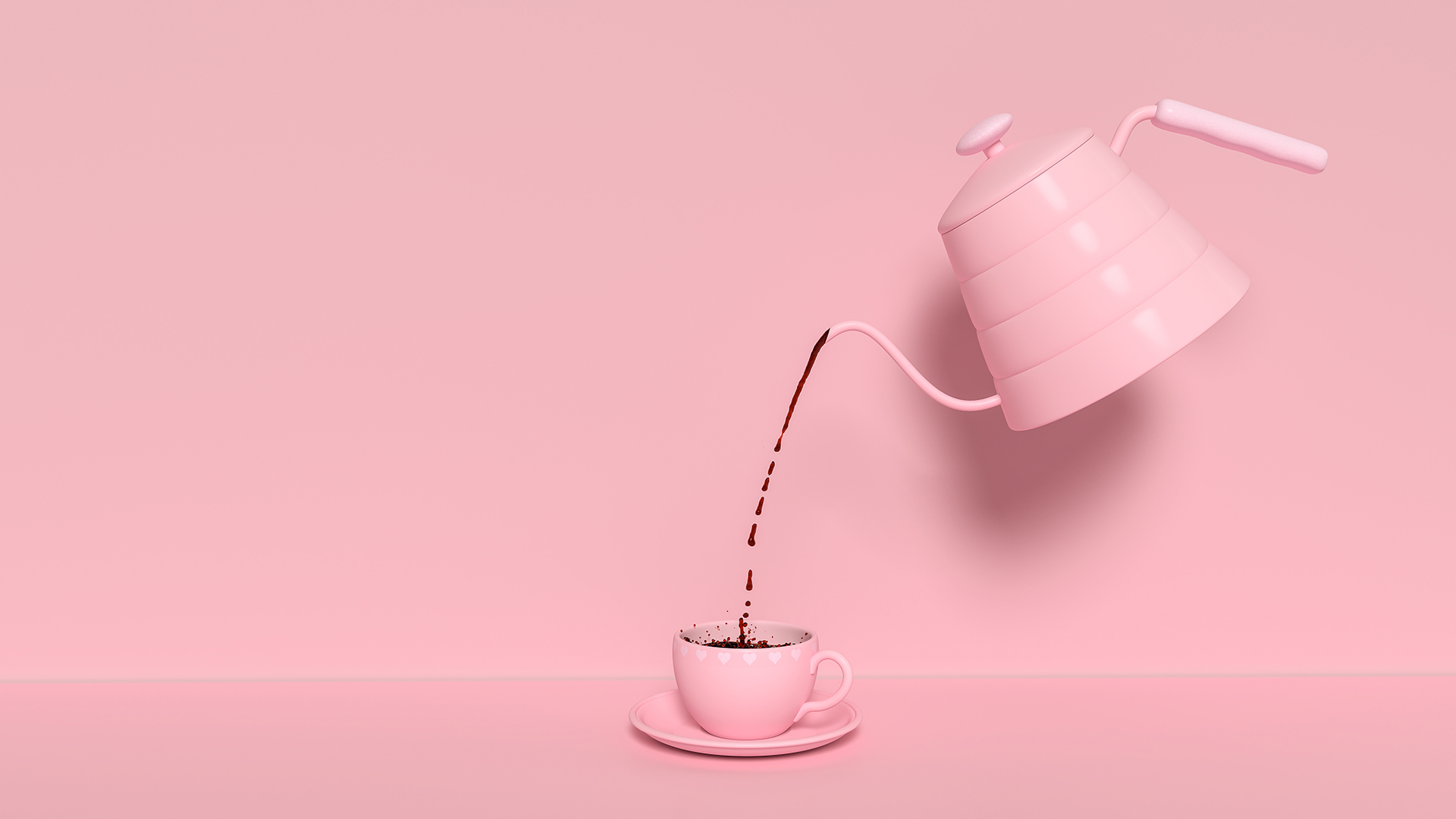 Pink coffee pot pouring coffee into a pink cup on a pink background
