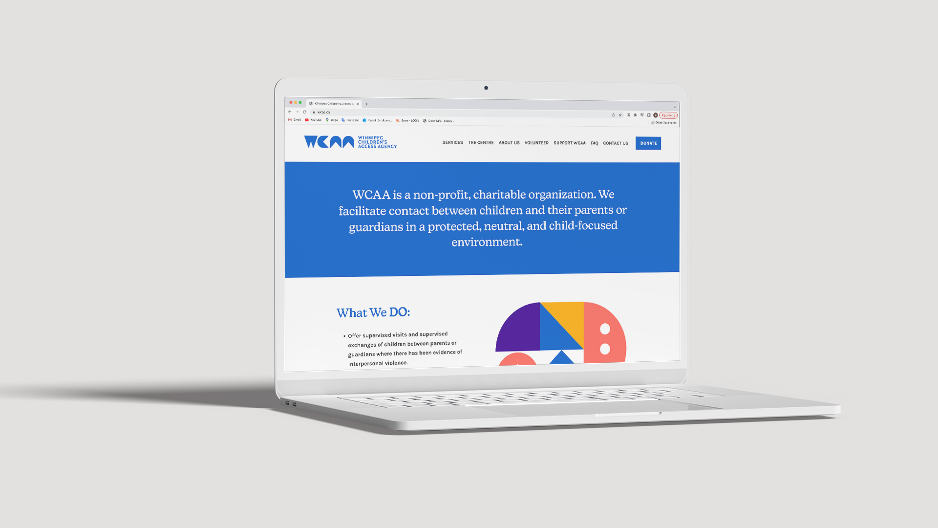 Mockup of the WCAA website on a white laptop screen
