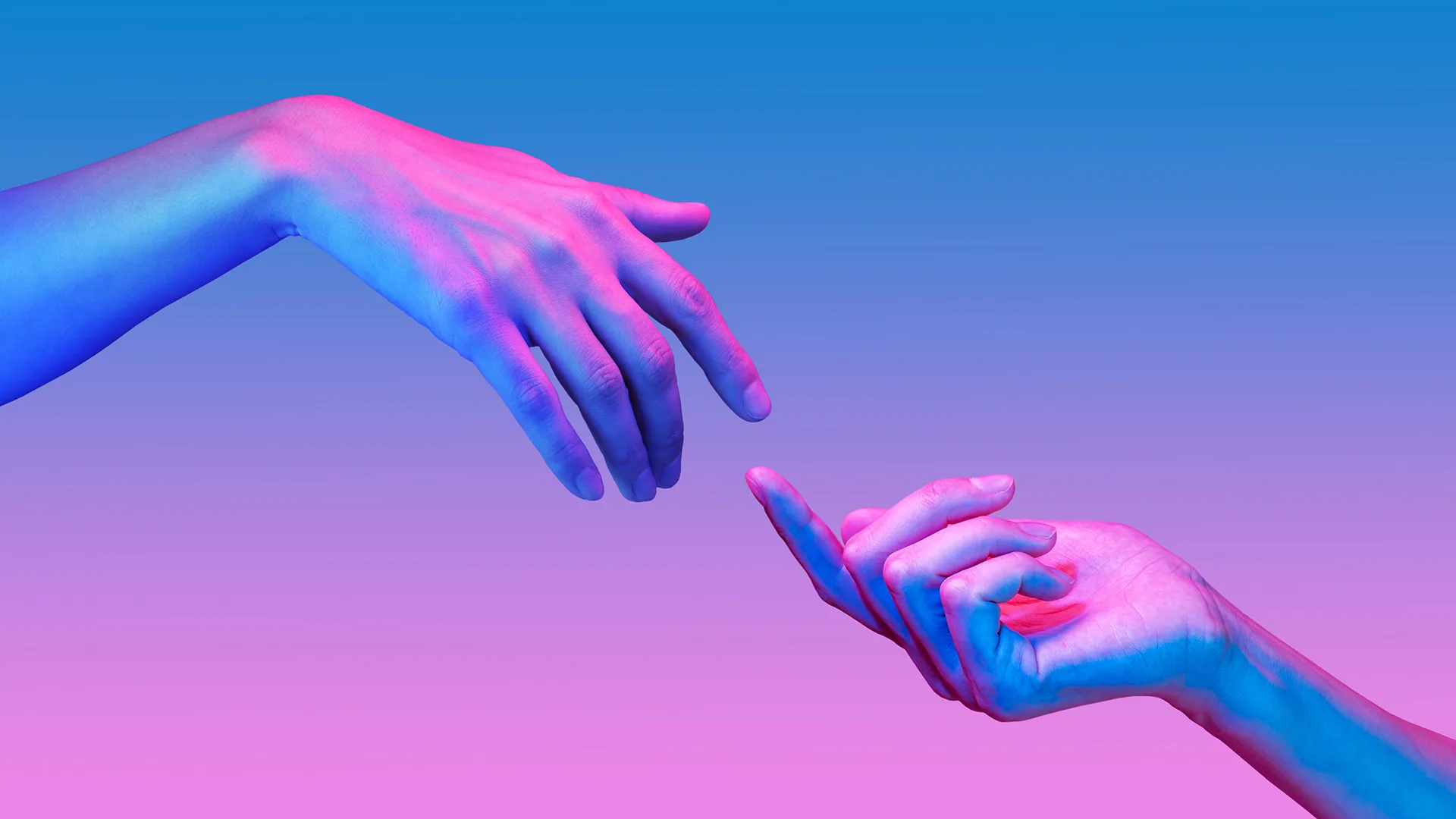 Two hands reaching towards each other in blue and pink lighting.