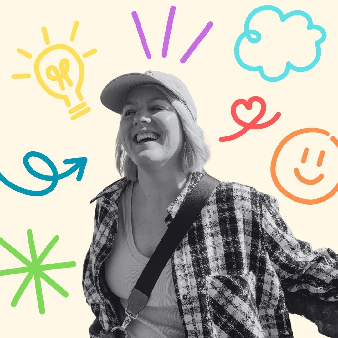 A black-and-white image of Brenlee, UpHouse's Creative Director, smiling and looking upwards, wearing a cap, plaid shirt, and crossbody strap. The background features colorful, hand-drawn illustrations, including a yellow lightbulb, purple lines, a blue cloud, a red heart, an orange smiley face, a blue arrow, and a green starburst, all on a pale yellow backdrop