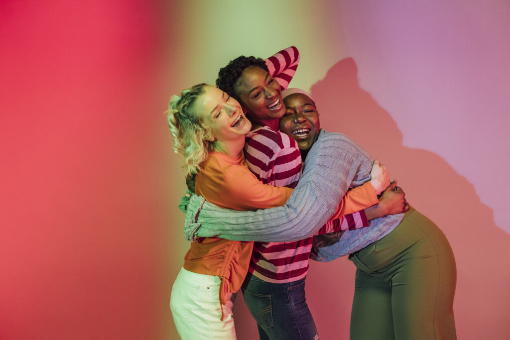 We Support Each Other Three women practicing pride